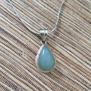 Chalcedony and silver pendant